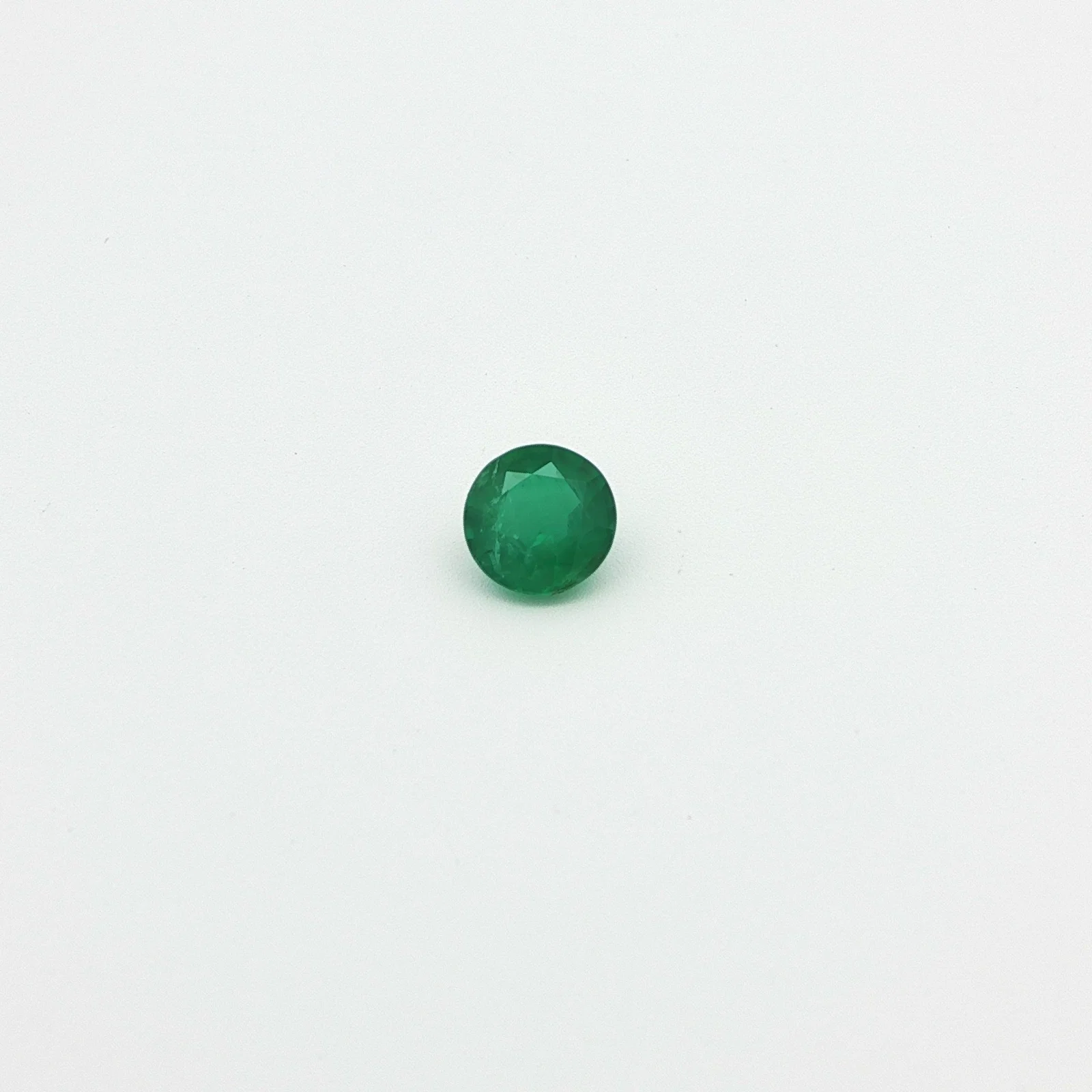 0.59 Carat Round Emerald