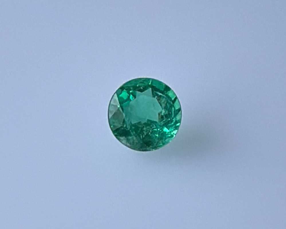 0.79 Carat Round Emerald